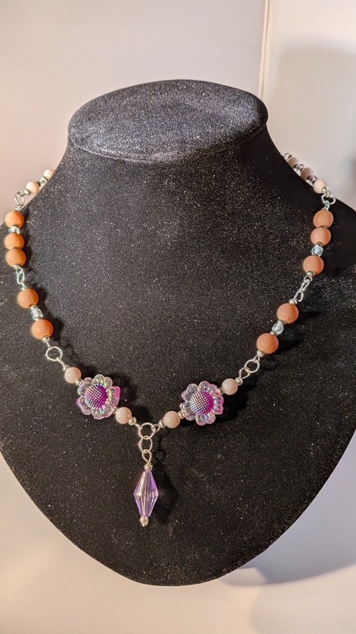 Zilveren hals ketting met bloem