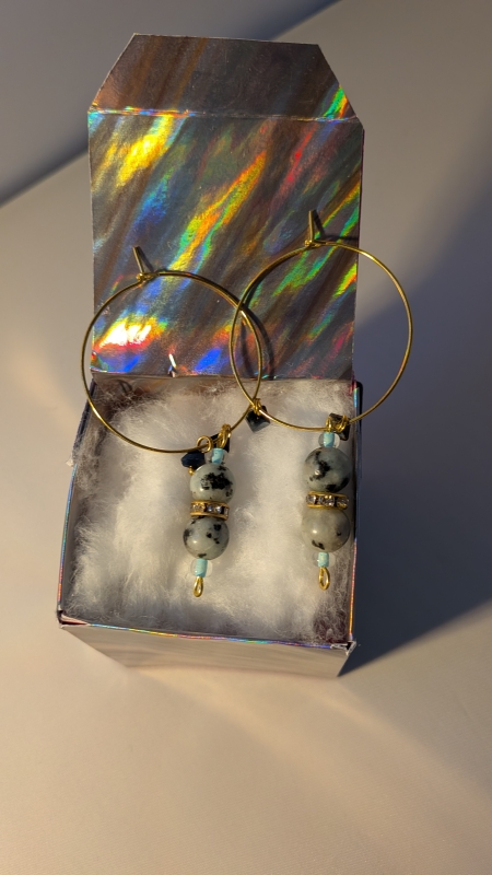 Gouden creolen met hanger