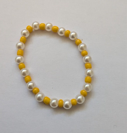 Elastische parel gele armband