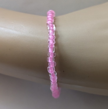 Licht roze rekarmband
